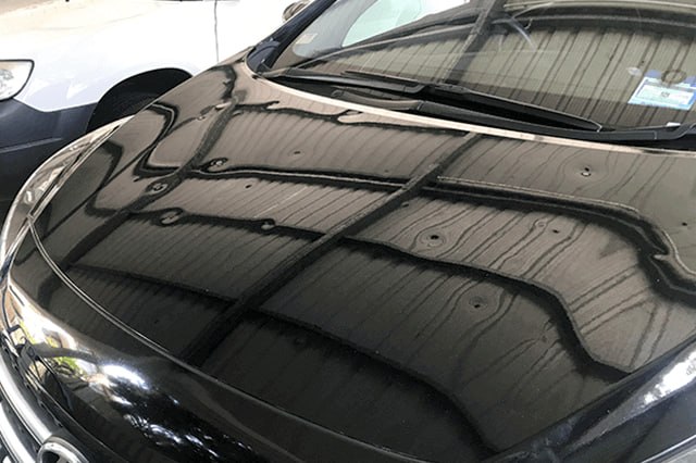 Hail damage dents on car hood PDR repair Peterborough Premium Dent Repair